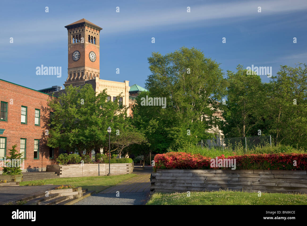 Tacoma, WA Fireman's Park with a view of the Old City Hall building (1892) in the Old City Hall Historic District Stock Photo