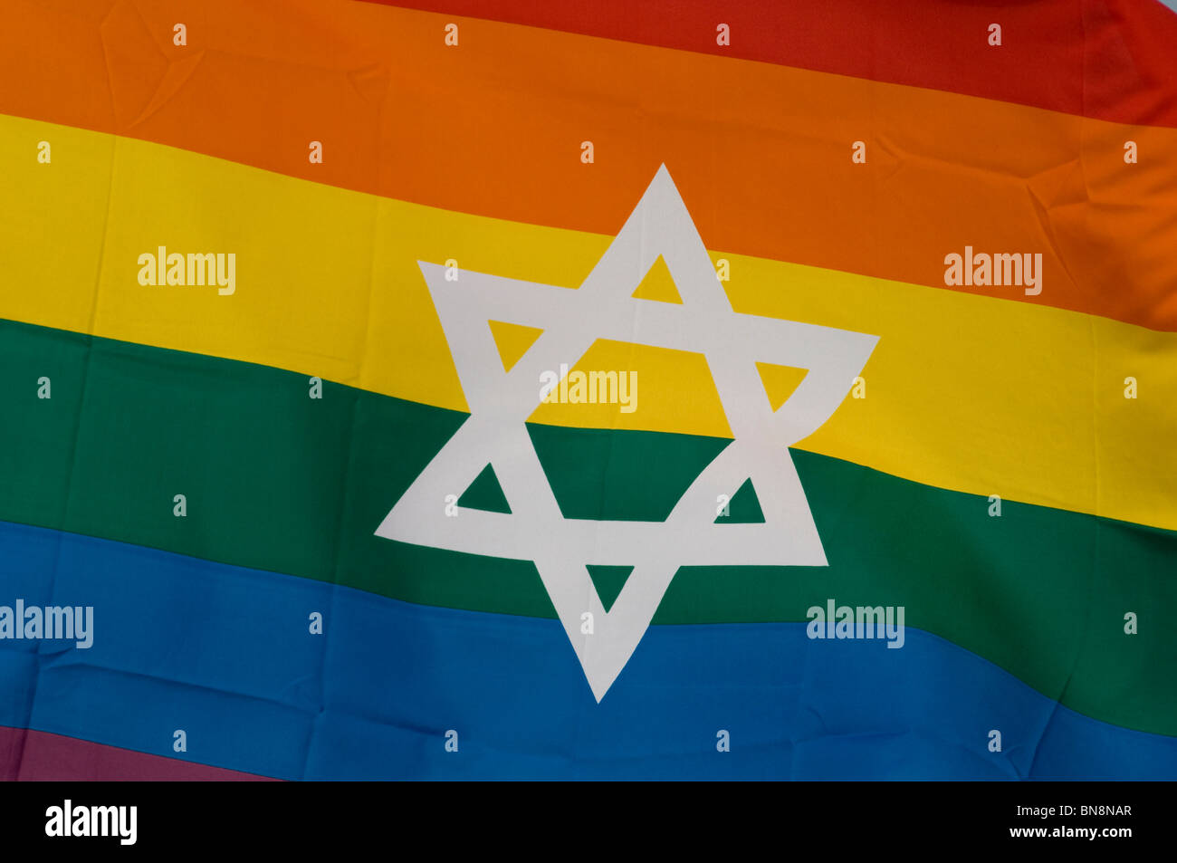 The rainbow flag symbol of LGBTQ Pride bearing the Jewish Star of David. Israel Stock Photo