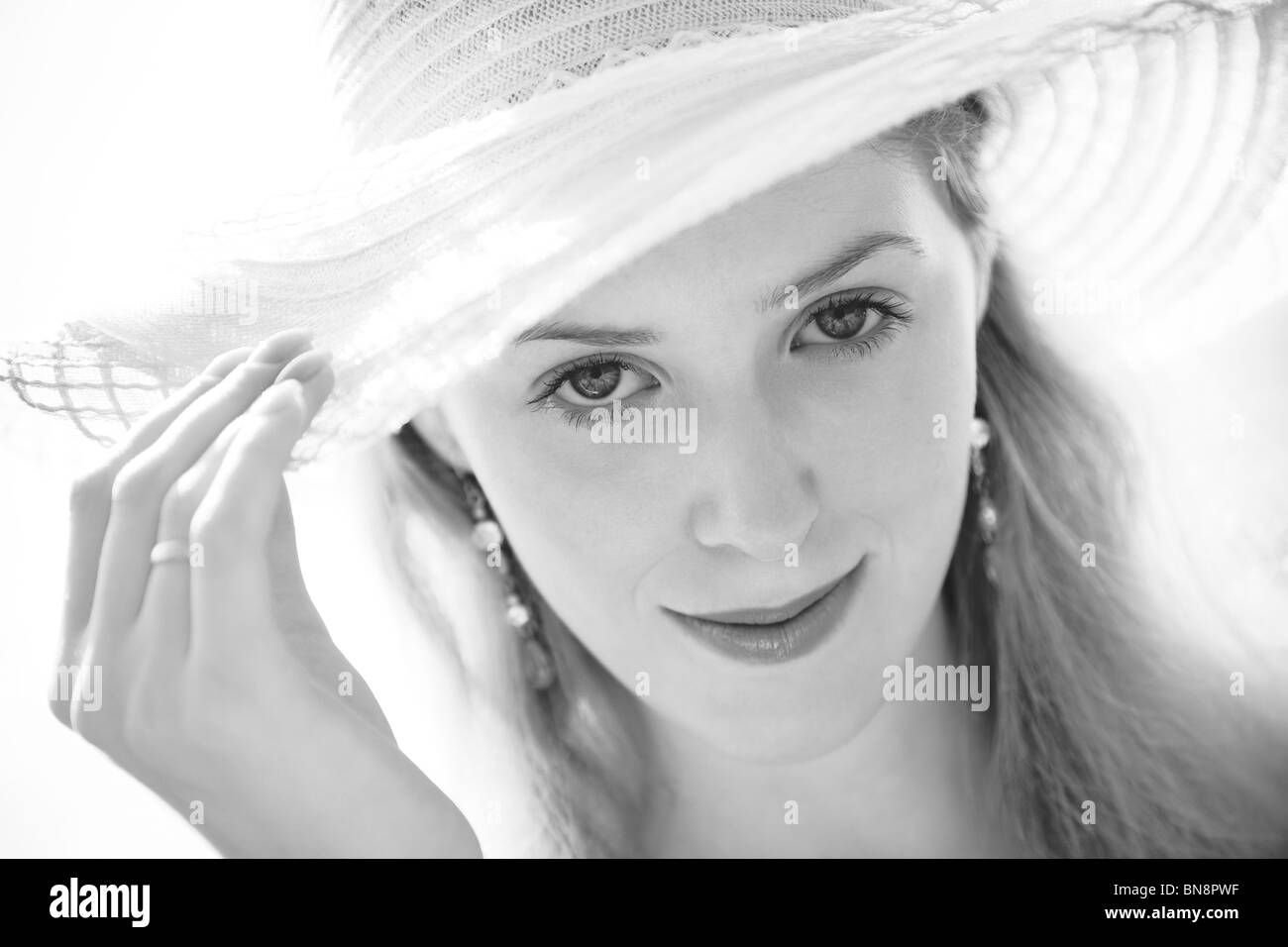 Young woman in hat portrait. Black and white Stock Photo - Alamy