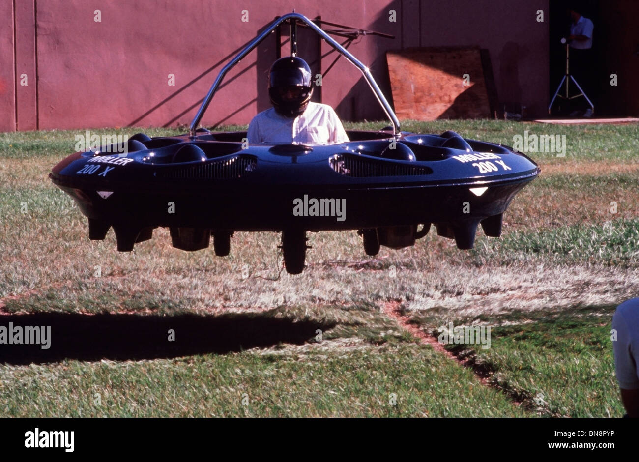 Dr. Paul Moller lifting off during a test flight of the M200X at Moller International in Davis California, 1988. Stock Photo