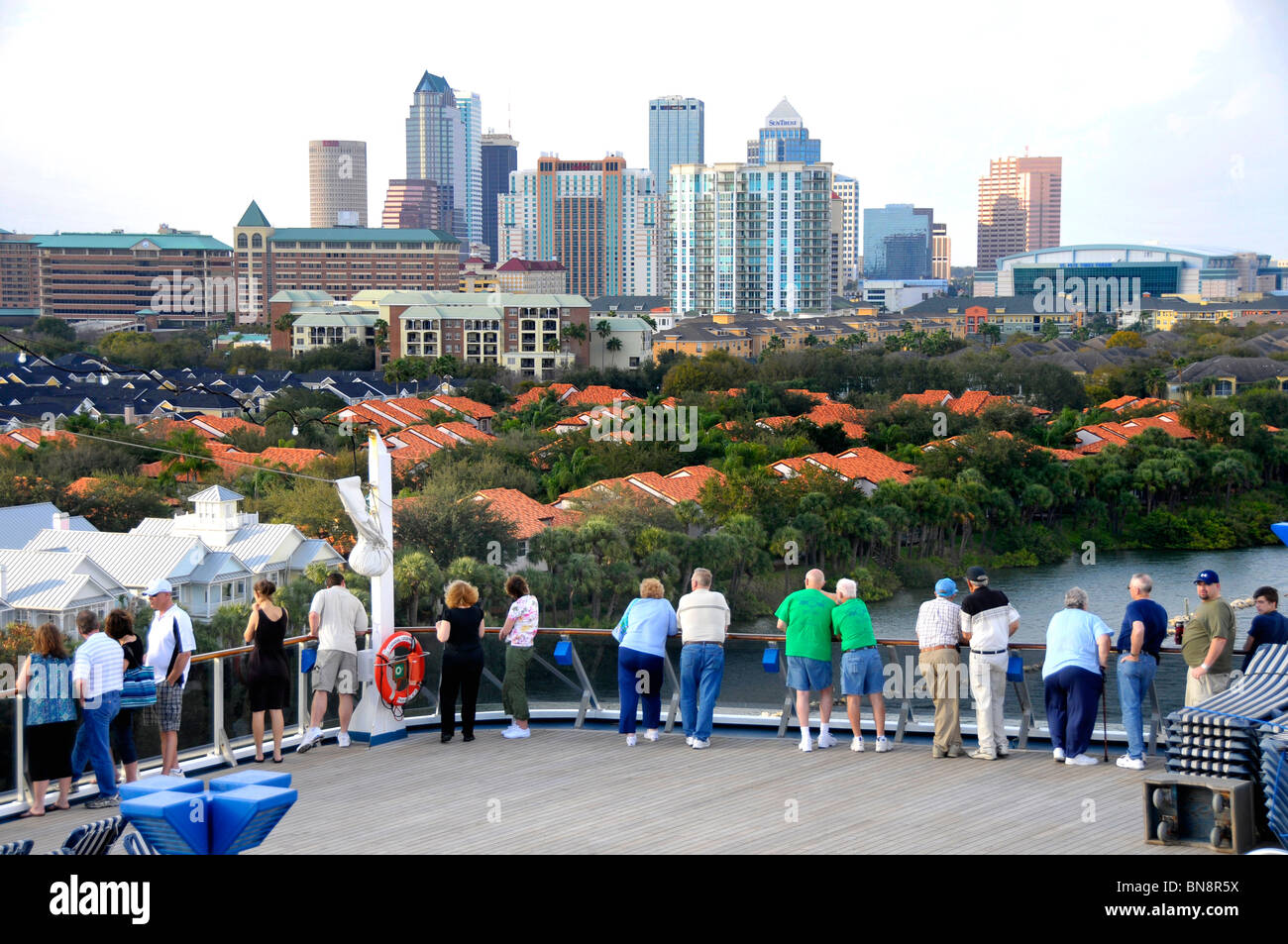 People viewing Downtown Tampa Bay Florida Skyline and homes from Cruise Ship Stock Photo