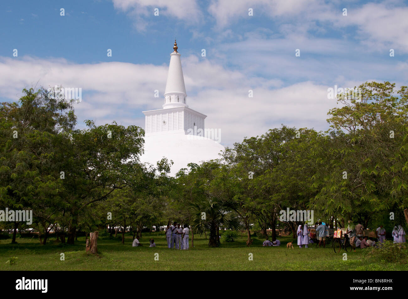 Sri Lankan Stupa and local scene at Anuradhapura Stock Photo