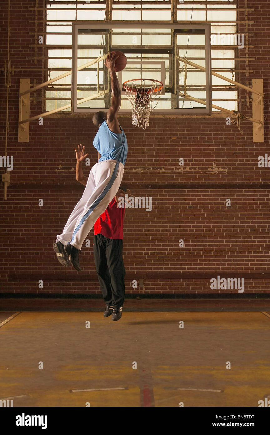 Men playing basketball Stock Photo