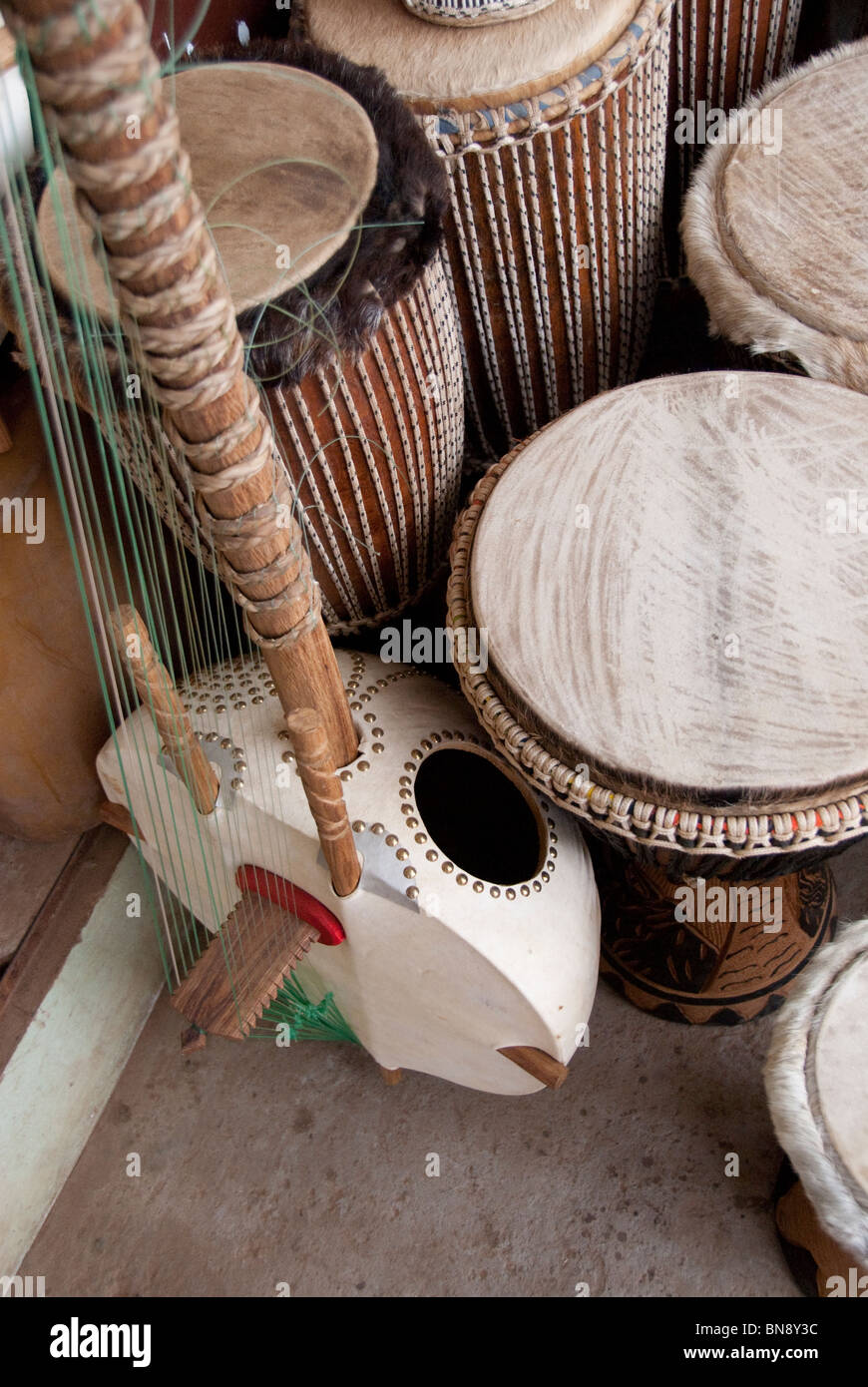Africa, Gambia. Capital city of Banjul. Typical animal hide covered ...