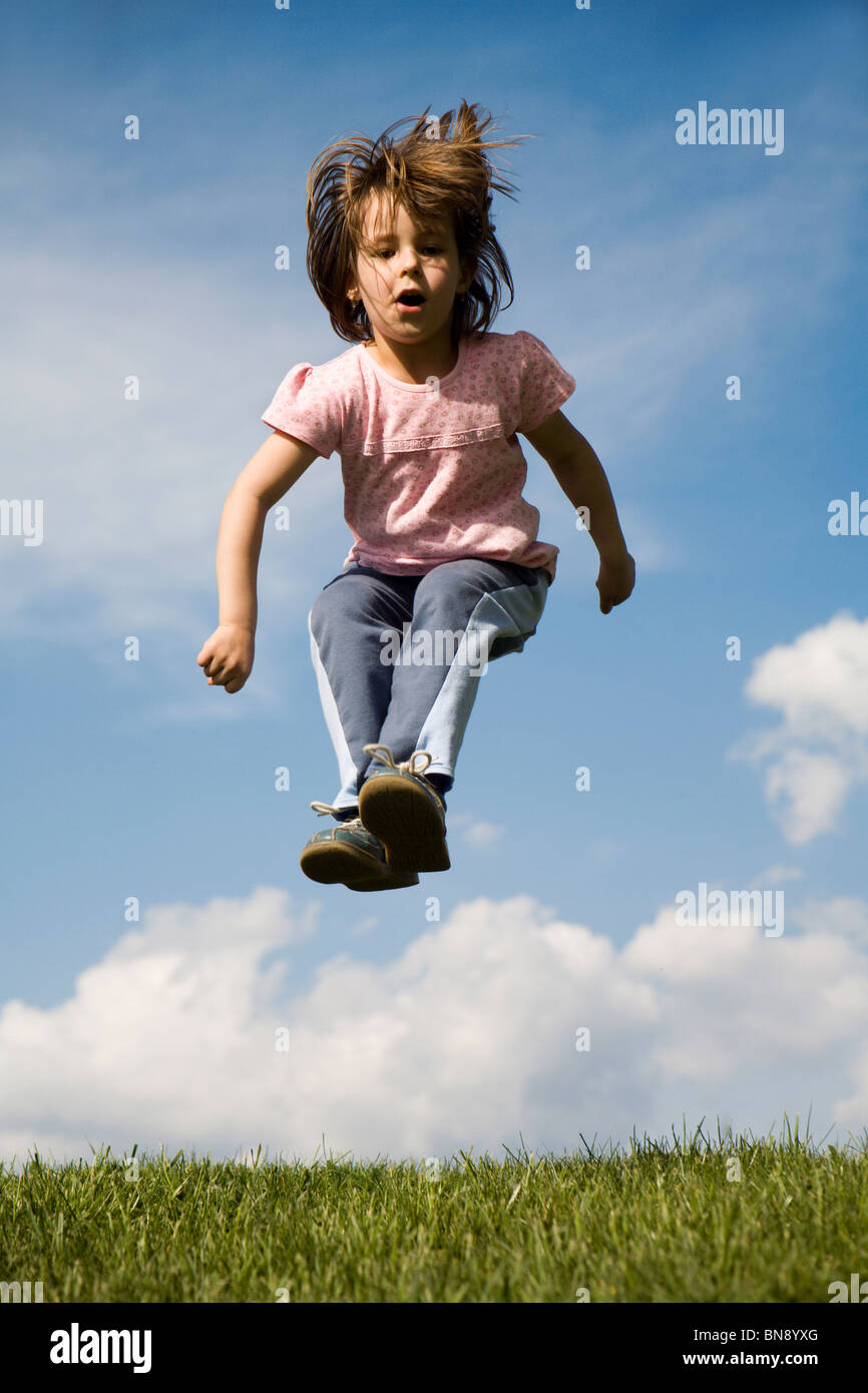 jump of child and the sky Stock Photo