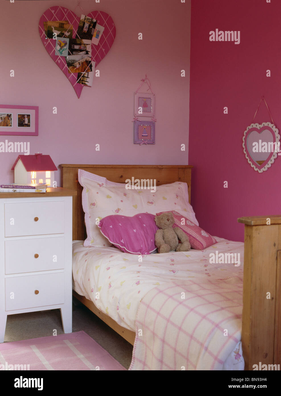Teenager S Pink Bedroom With Pine Bed And Pink Heart Shaped