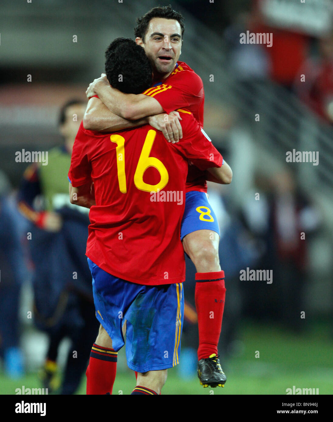 XAVI & SERGIO BUSQUETS CELEBR GERMANY V SPAIN DURBAN STADIUM DURBAN