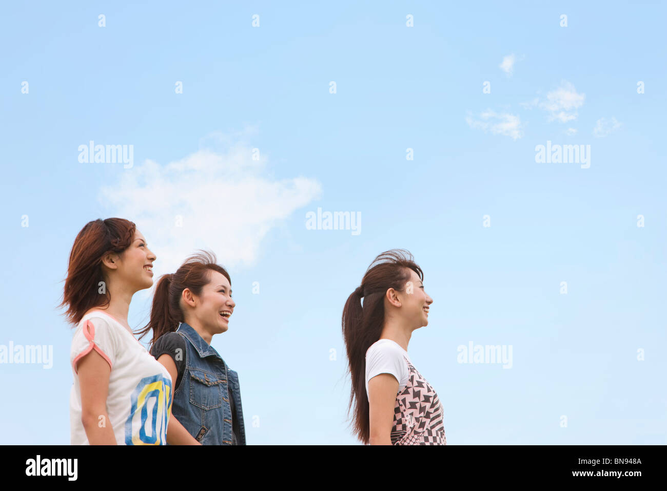 Three companions standing hi-res stock photography and images - Alamy