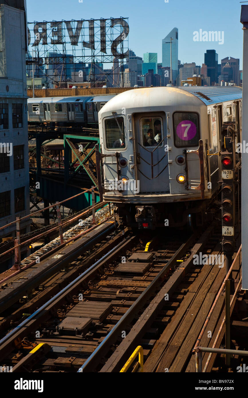 Train above ground on the 7 subway line in Queens, New York Stock Photo