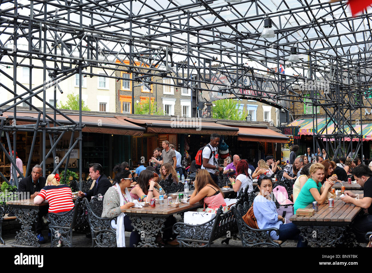 Busy outdoor restaurant at Camden Market in north London. Stock Photo