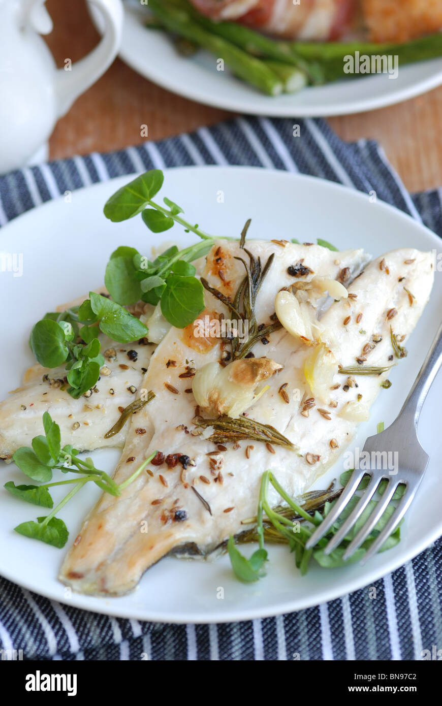 Sea bass fillets with watercress Stock Photo Alamy