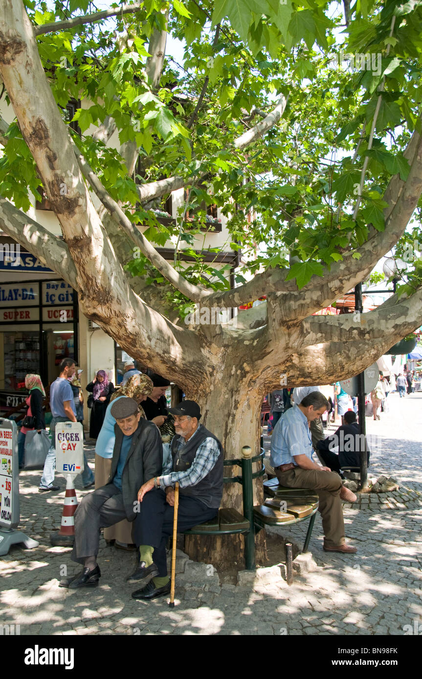 Bursa Kapali Carci Baz Market Bazaar Turkey Anatolia Old men resting in a tree man Stock Photo