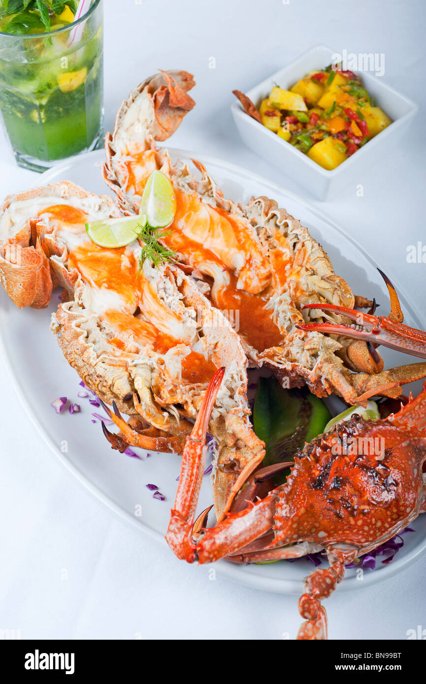 A la carte seafood meal of fresh crab and lobster on a white plate