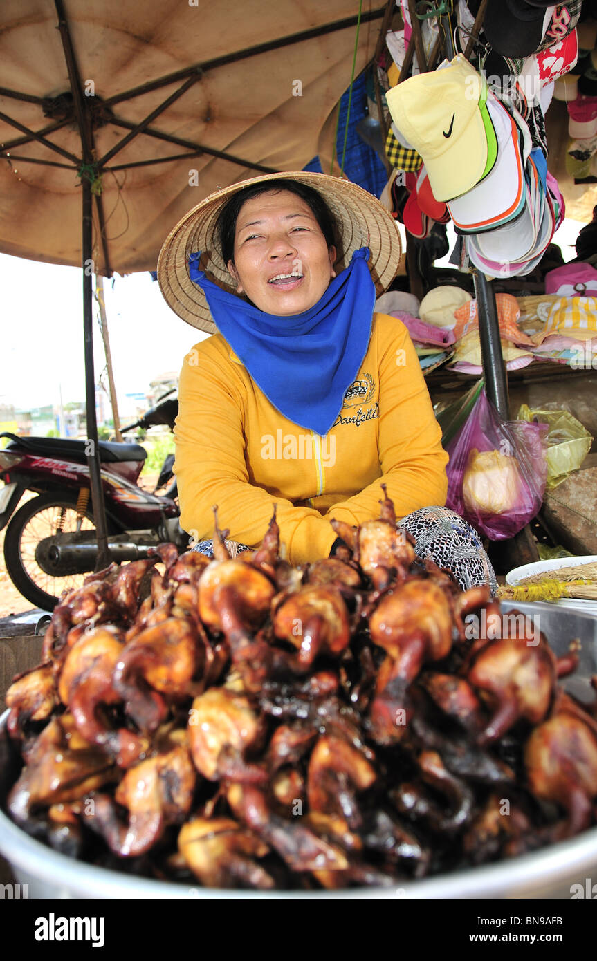 Cooked pigeon for sale in a market in Vietnam Stock Photo