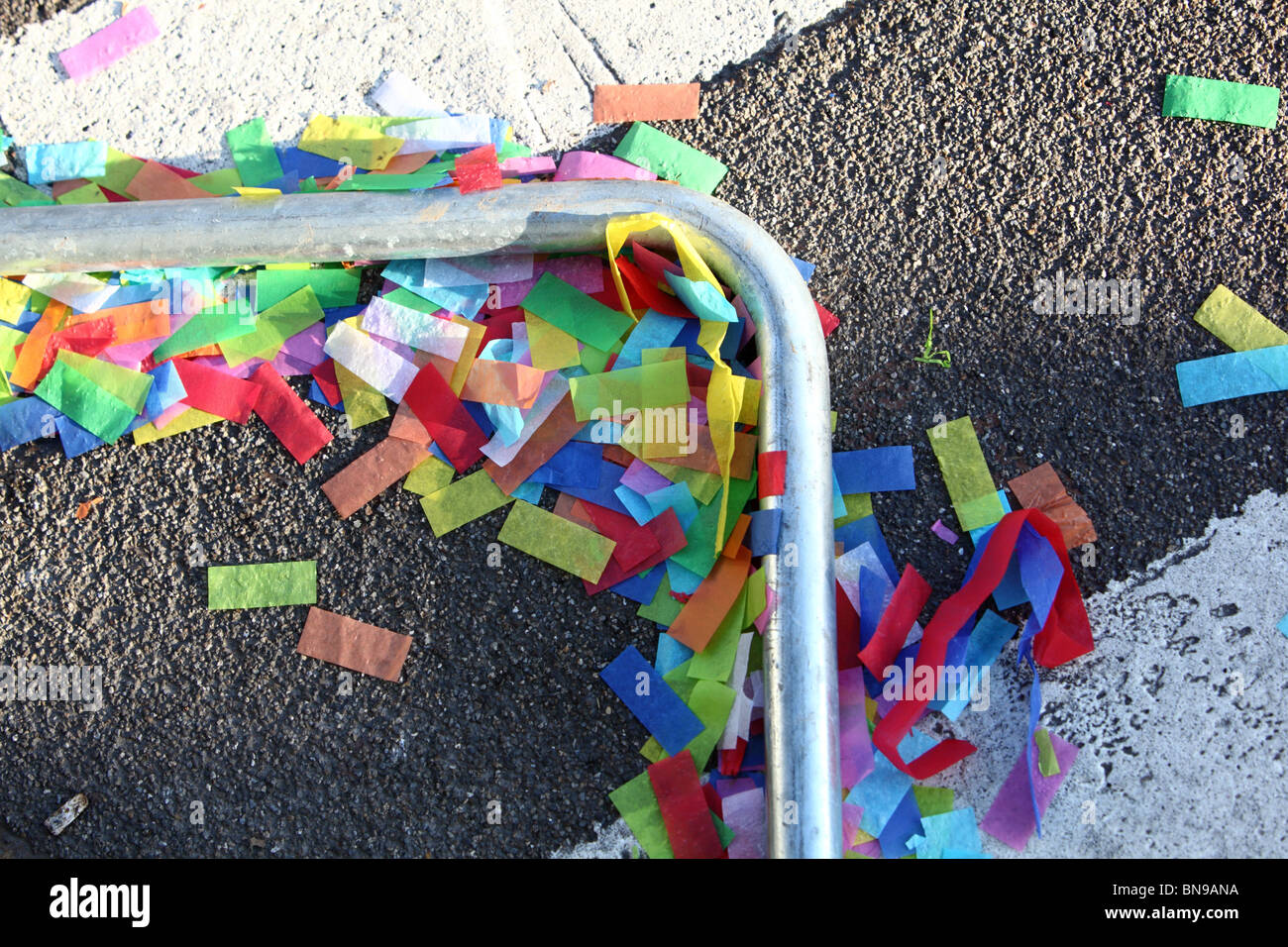 Ticker tape lying on the road after the New Years Day Parade, Westminster, London, SW1. Stock Photo