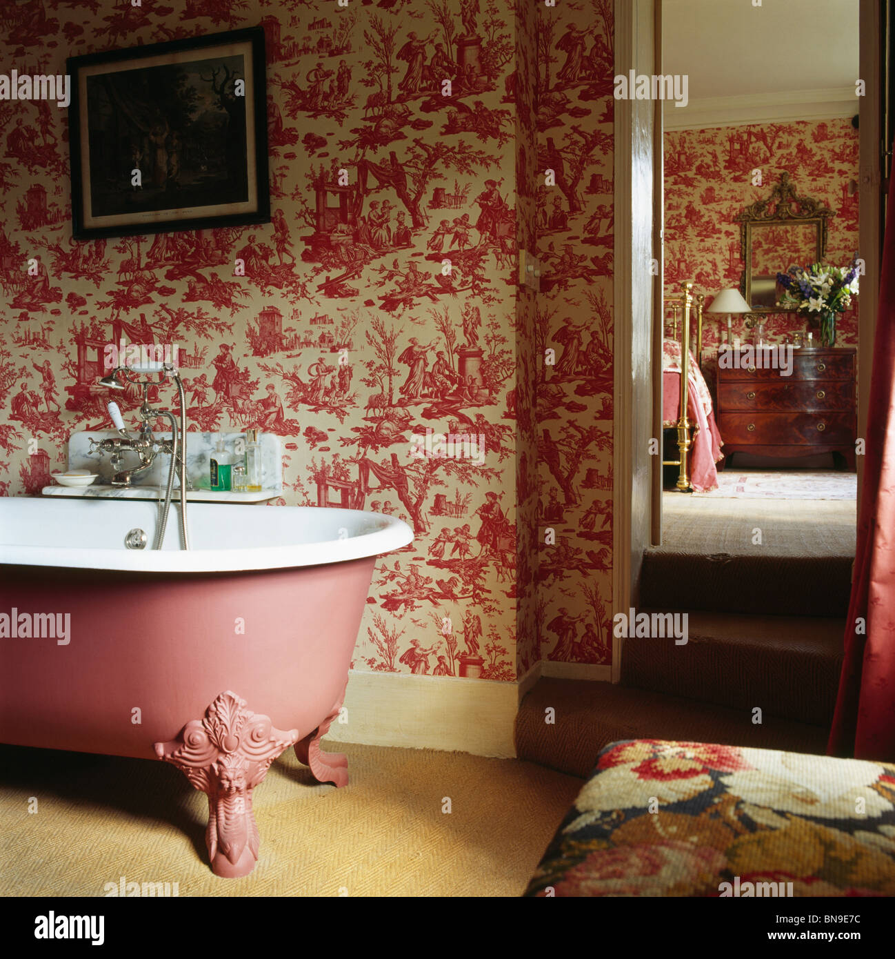 Large ensuite bedroom with toile de jouy wallpaper and matching folding  screen Stock Photo  Alamy