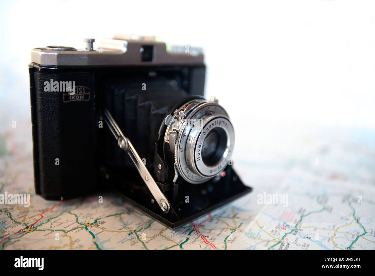 Map and camera Stock Photo - Alamy