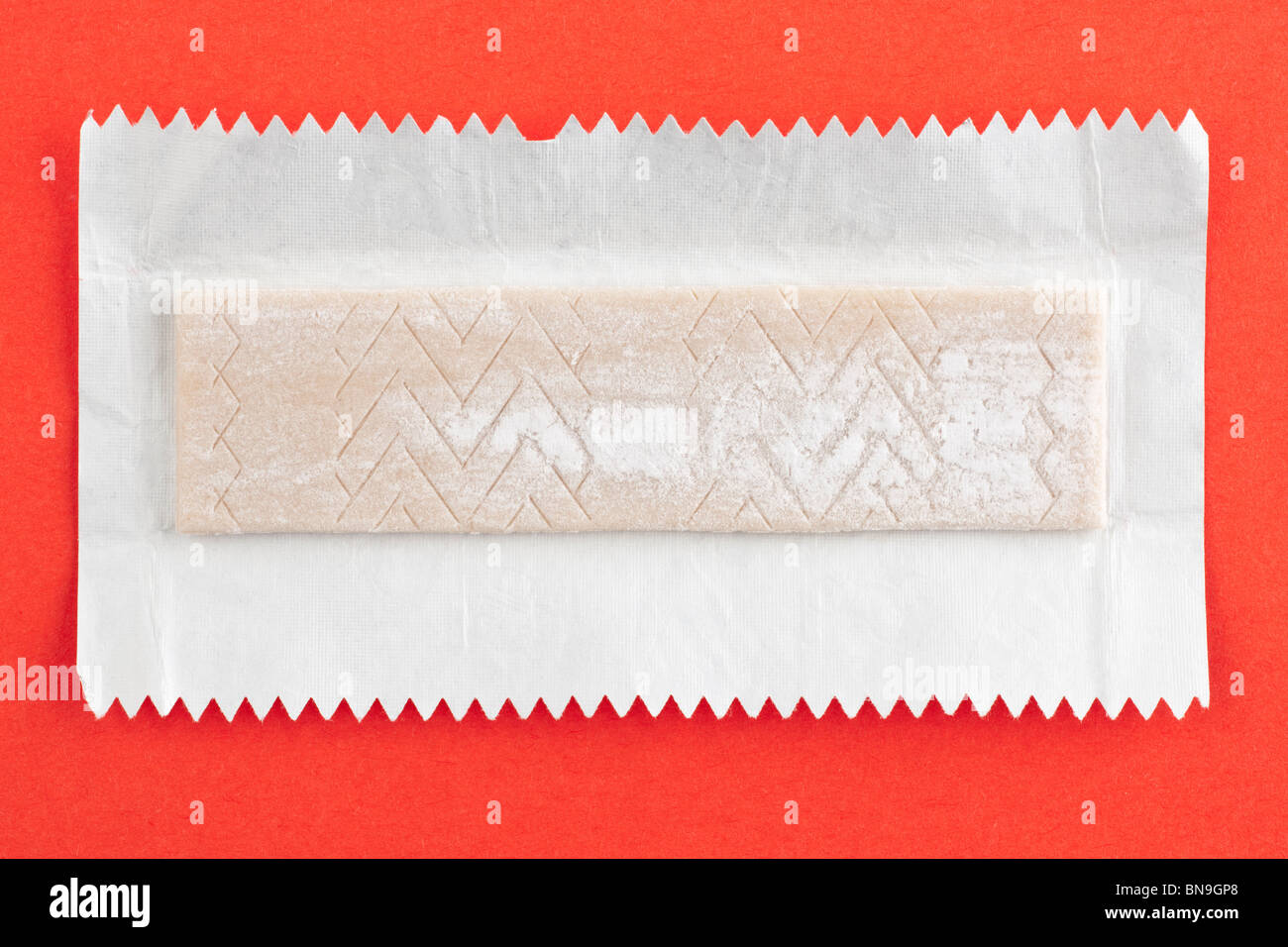 Piece of Wrigley's juicy fruit chewing gum and wrapper Stock Photo Alamy