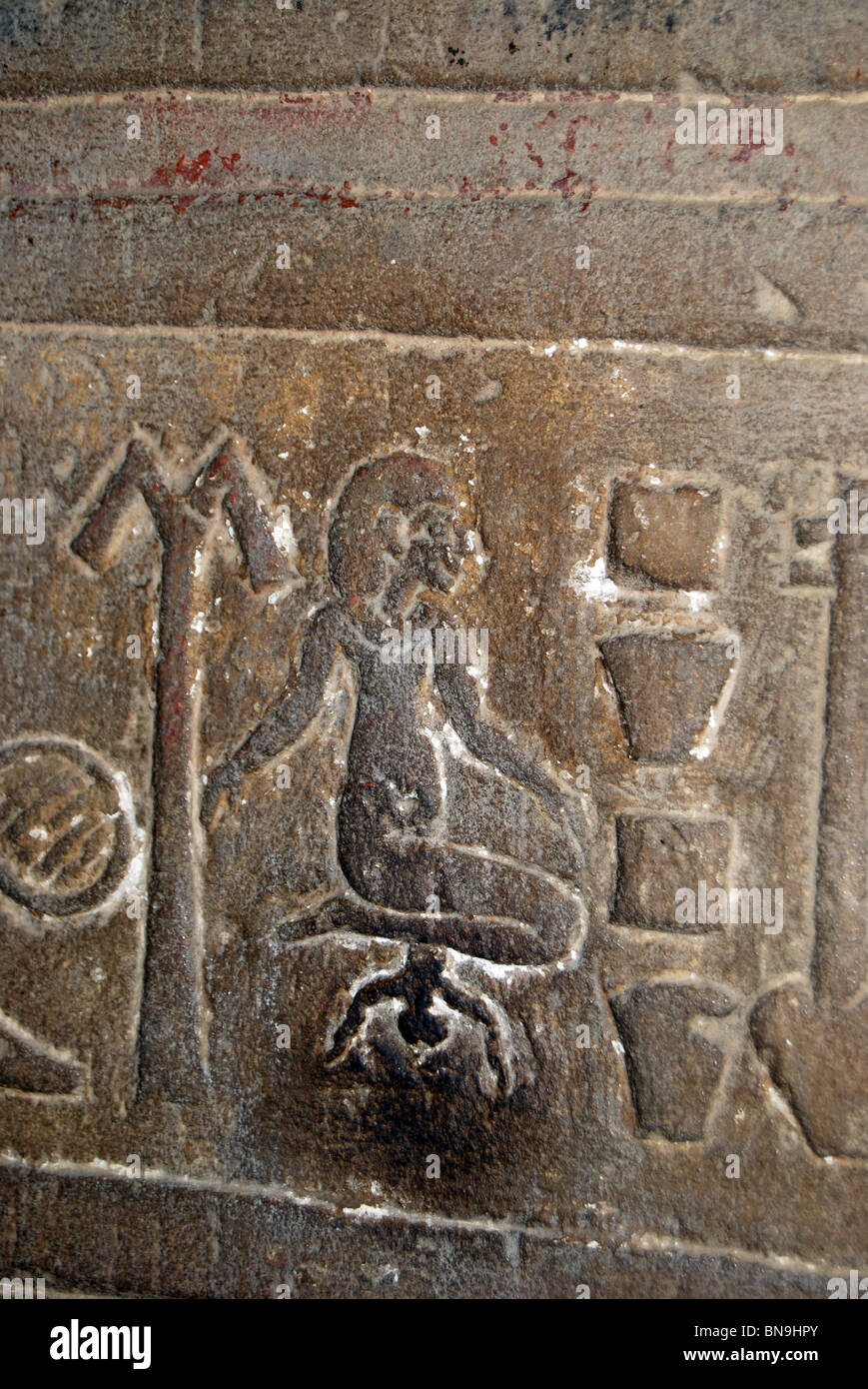 Squatting to give birth shown on a relief carving at Kom Ombo Temple on the upper Nile. Number 2912 Stock Photo