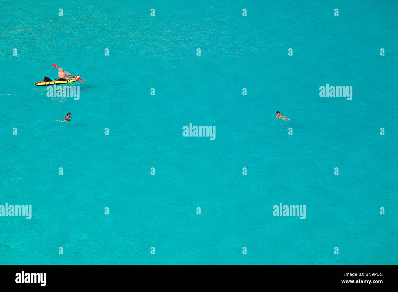 Tourists Swimming In The Sea At Spiaggia Rena Bianca Santa