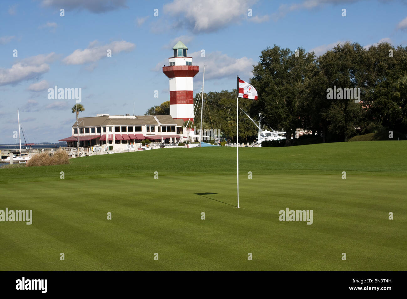 The famous Hilton Head Lighthouse stands behind the 18th green of the