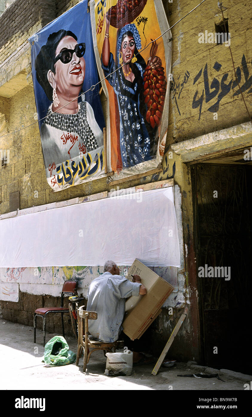 Caricaturist and his artwork in the souks of Islamic Cairo. Stock Photo