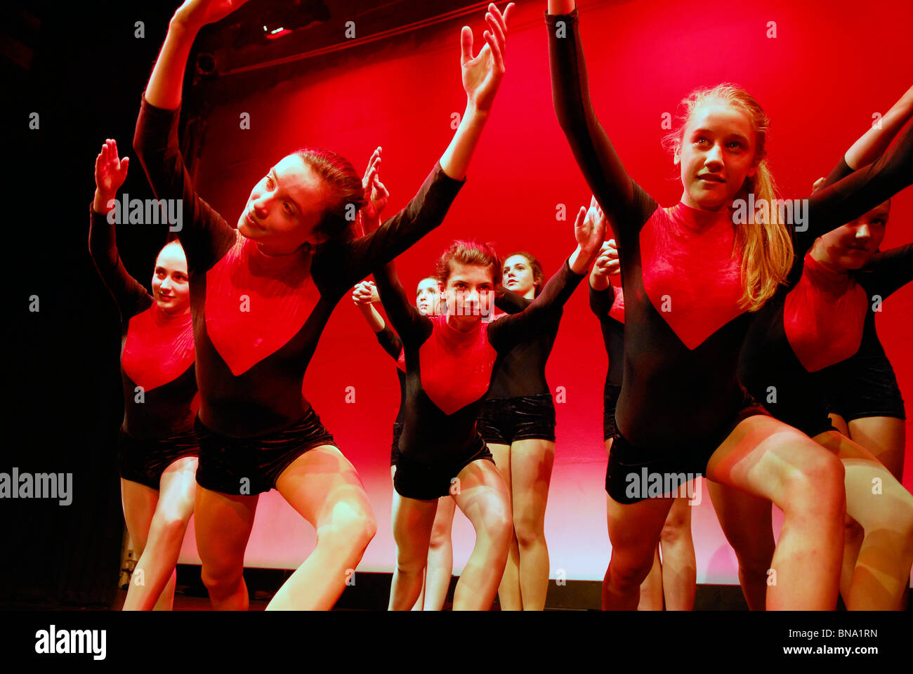 Group of young students from Haslemere Performing Arts group on stage during Dance Fever production, Haslemere, Surrey, UK. Stock Photo