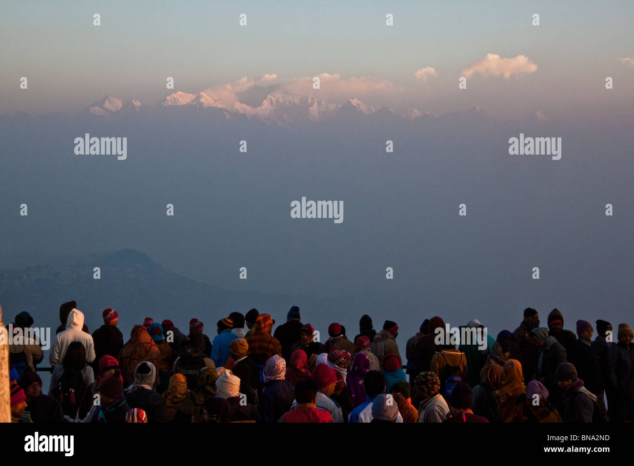 Tourists watch the sunrise and  panoramic view of Kanchenjunga massif as seen from Tiger Hill at Darjeeling, West Bengal, India. Stock Photo