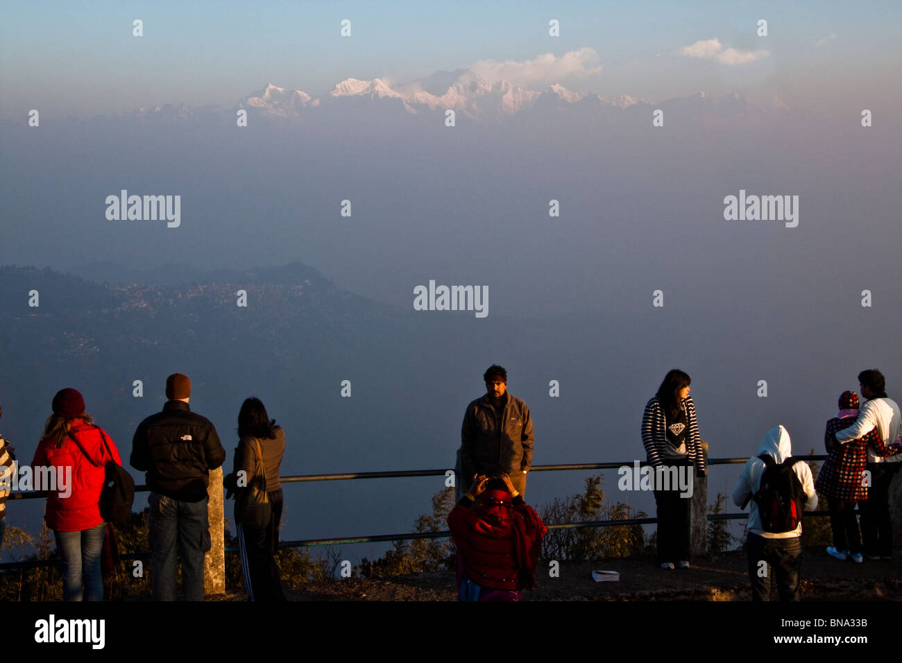 Tourists watch the sunrise and  panoramic view of Kanchenjunga massif as seen from Tiger Hill in Darjeeling, West Bengal, India. Stock Photo