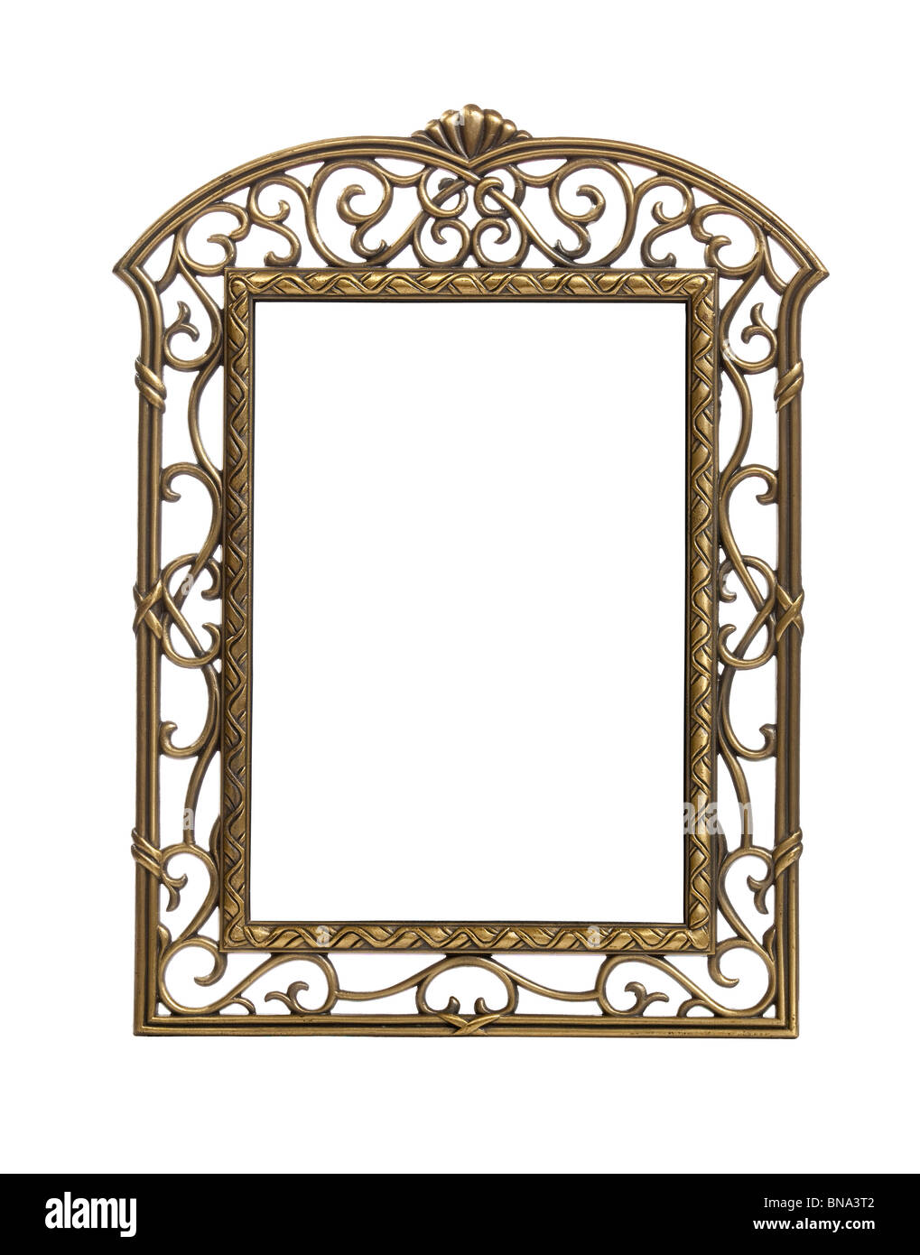 Isolated brass colored carved picture frame against white Stock Photo
