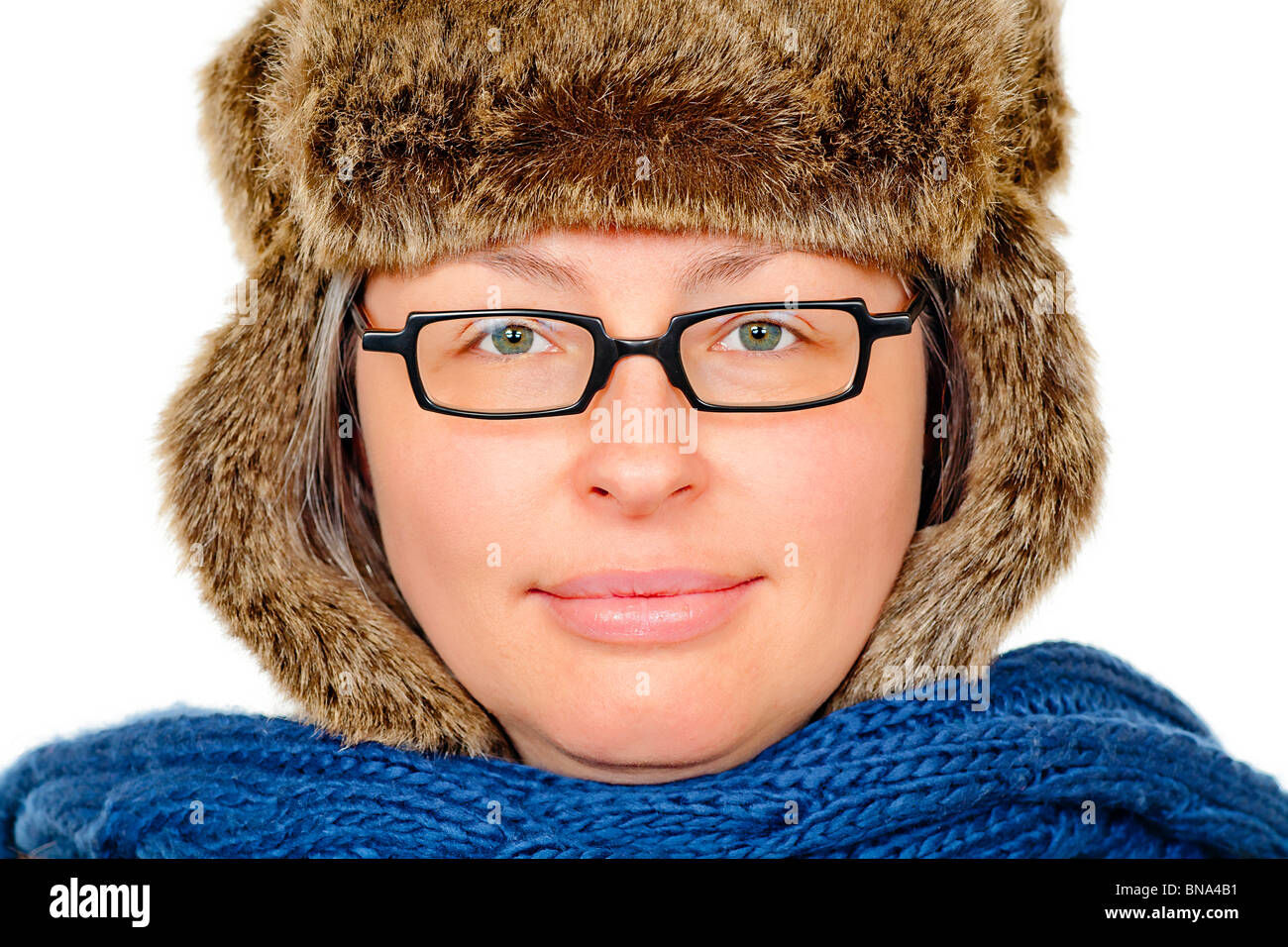 Woman dressed in Russian hat and heavy coat. Stock Photo