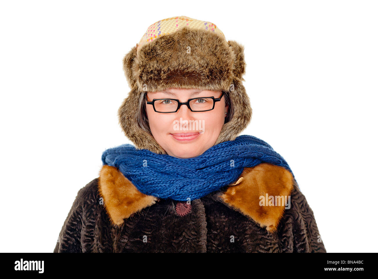 Woman dressed in Russian hat and heavy coat. Stock Photo