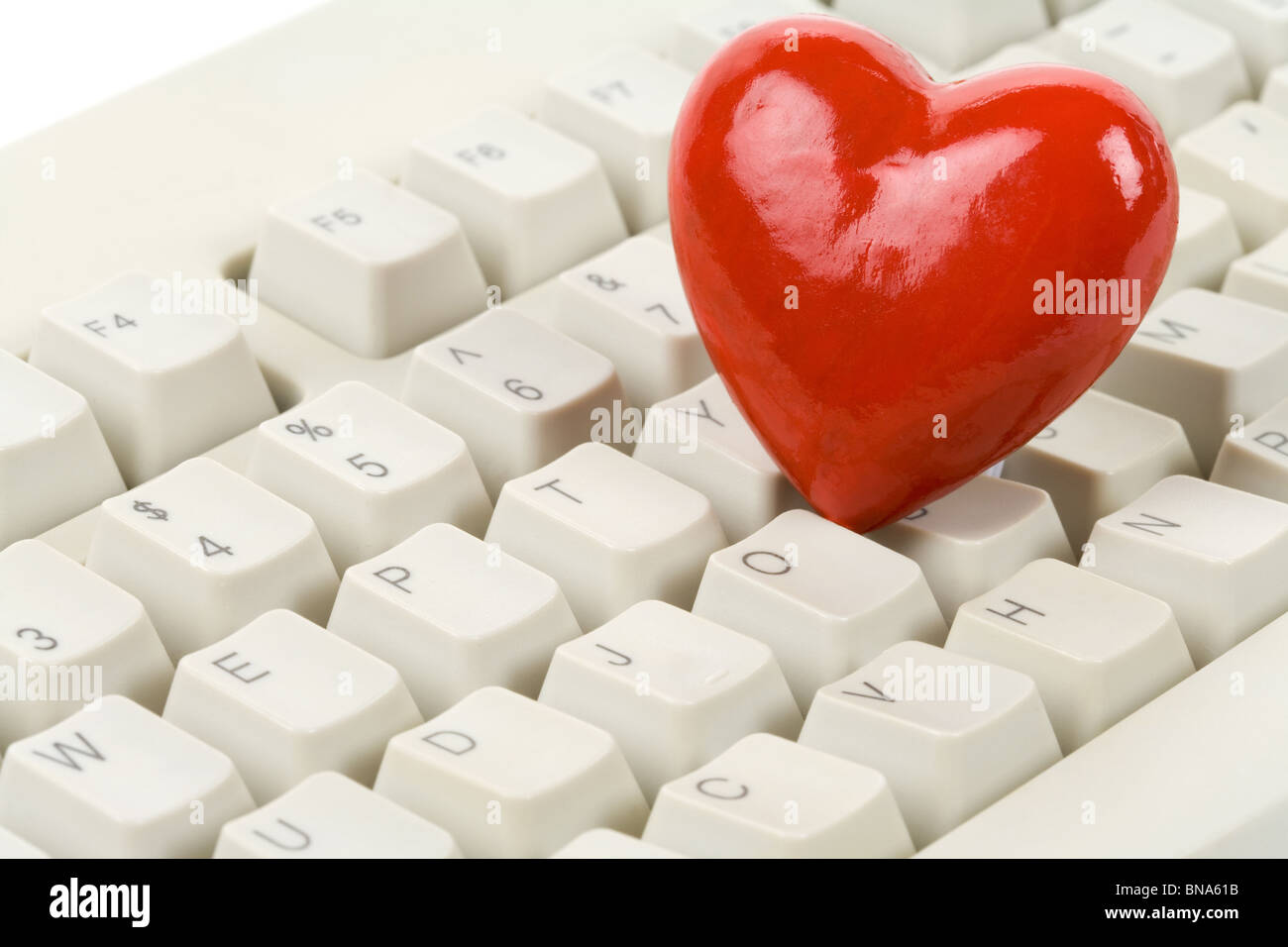 Red Heart Shape and computer keyboard Stock Photo Alamy