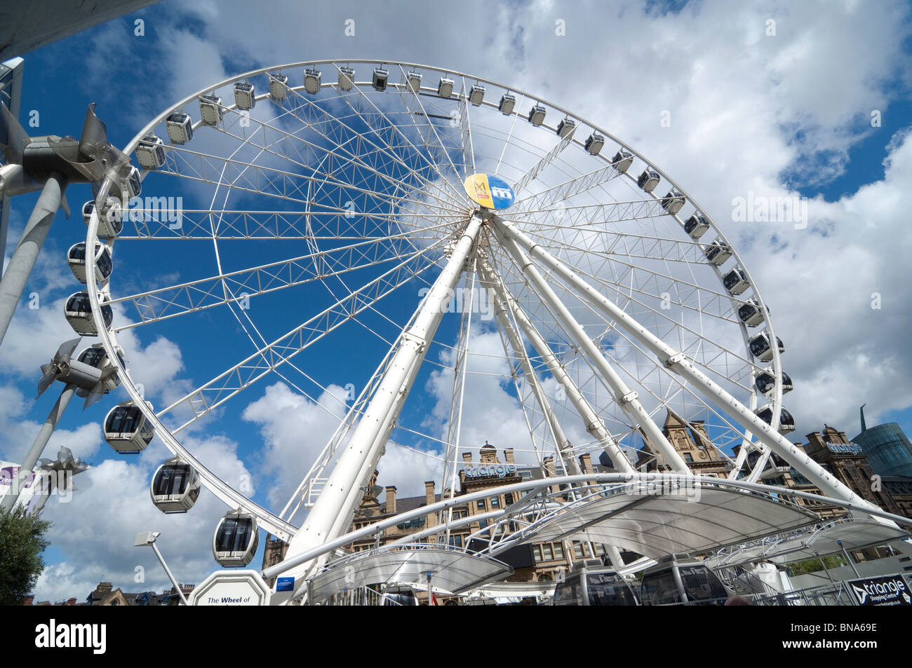 the Wheel of Manchester for the bigger picture Stock Photo