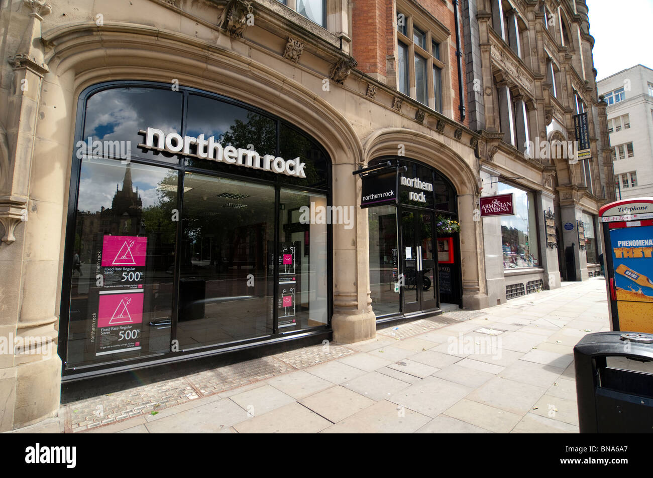 Shop fronts in Albert Square, Manchester, Northern Rock facade Stock Photo