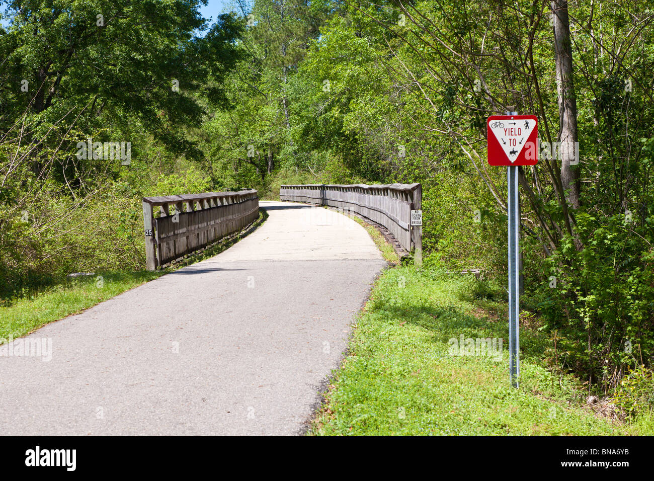 Bicycle, horse, and hiking trail is part of the Rails to Trails project Stock Photo