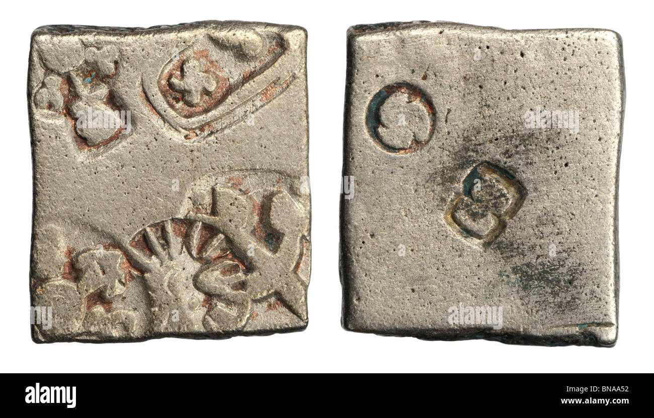 Ancient Indian Silver punchmark coin. Vidharba (600-300 BC) Obv: Swastika / Tree / Sun / Standard with Taurines Stock Photo