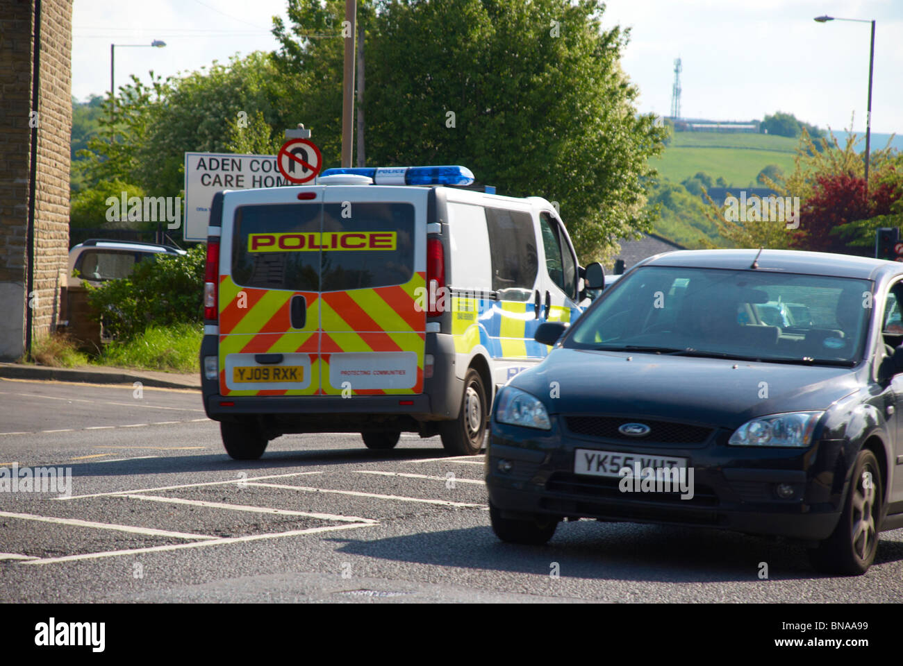 Police van heading towards Huddersfield. Stock Photo