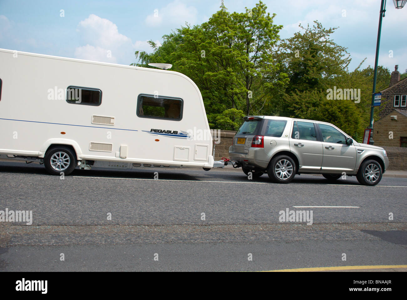 car towing a caravan Stock Photo Alamy