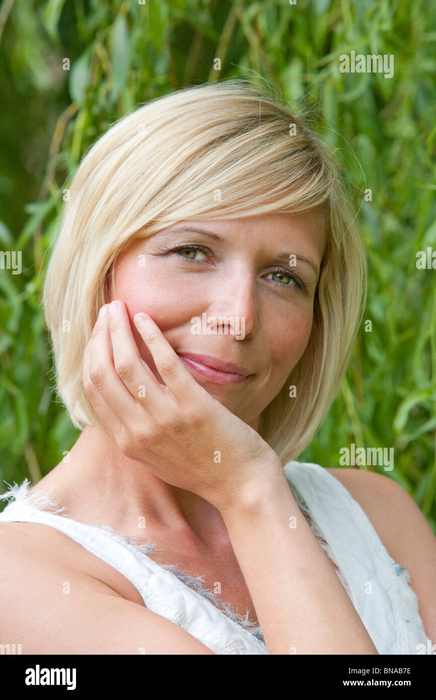Hand on face woman hi-res stock photography and images - Alamy