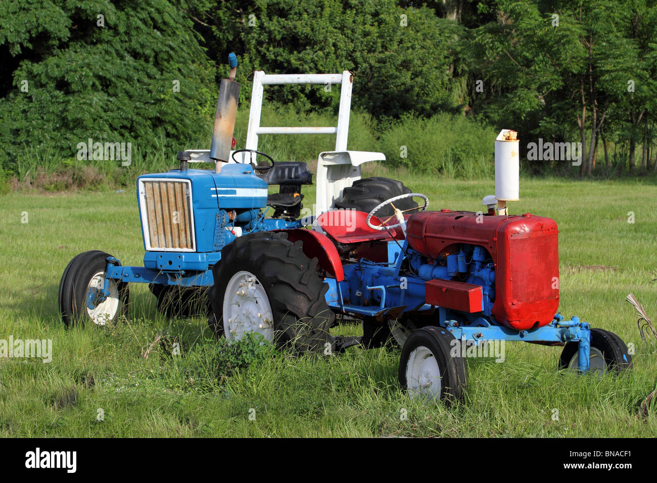 Tractors are waiting for their farmer. Stock Photo