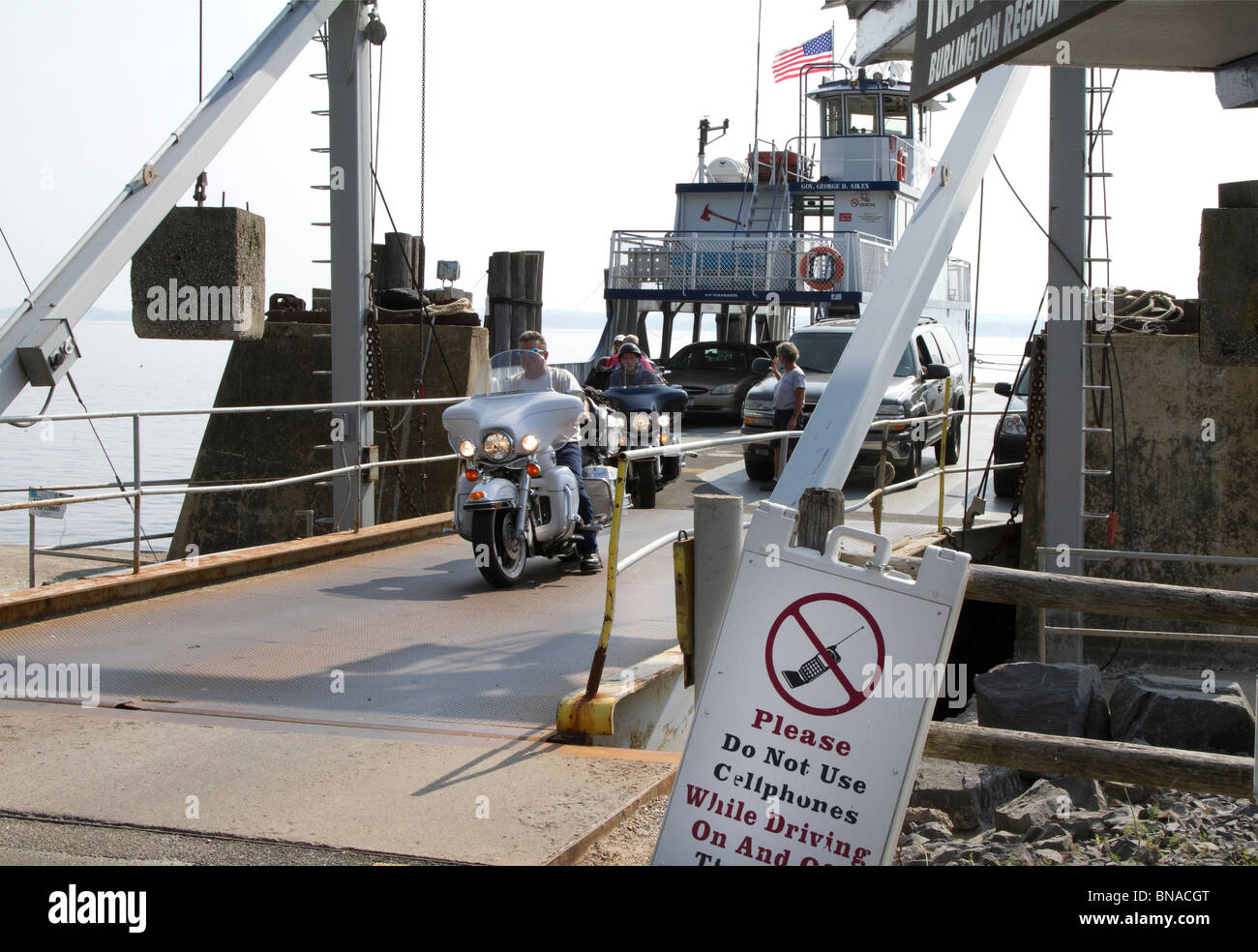 Motorbikes motorcycles unloading from the Aiken Lake Champlain ferry at
