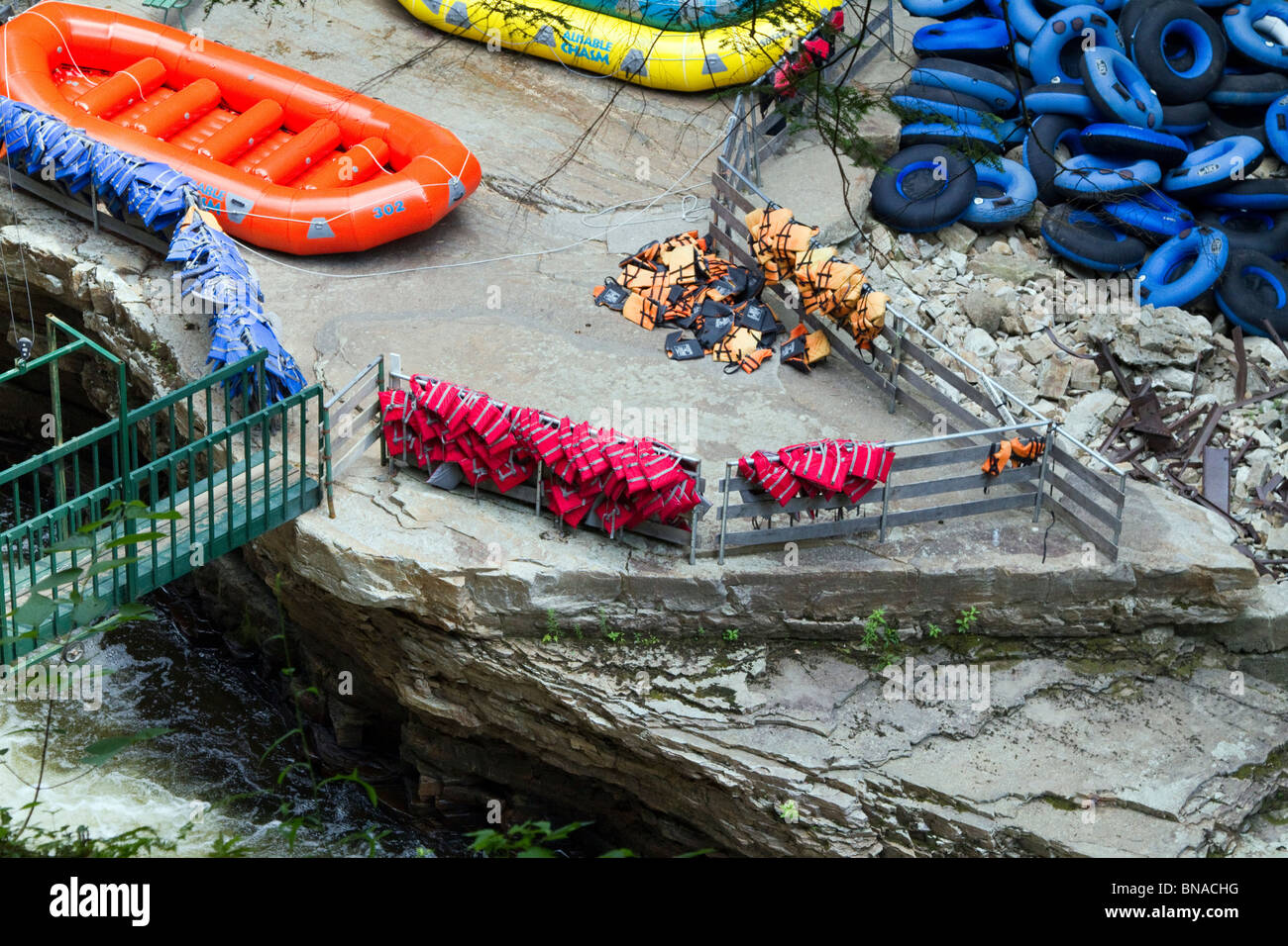Rubber rafts, life vests and tubes for floating down the Ausable Chasm in the Adirondack State Park of New York. Rafting Stock Photo