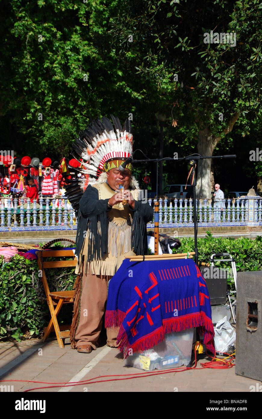 American Indian busker in the Plaza de Espana, Seville, Seville Province, Andalucia, Spain, Western Europe. Stock Photo