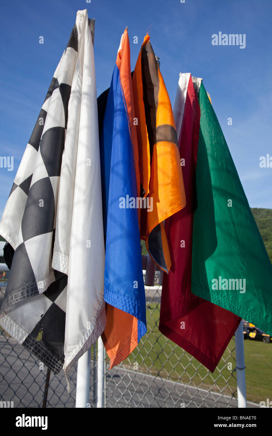 Woodstock, New Hampshire - Signal flags on the flagman's stand during stock car racing at White Mountain Motorsports Park. Stock Photo