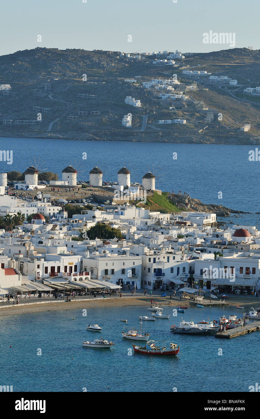 Mykonos. Greece. View of whitewashed buildings, windmills and the port of Hóra (Mykonos Town). Stock Photo