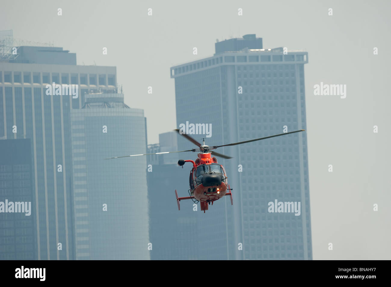 Coast Guard Rescue Helicopter and Manhattan skyline Stock Photo