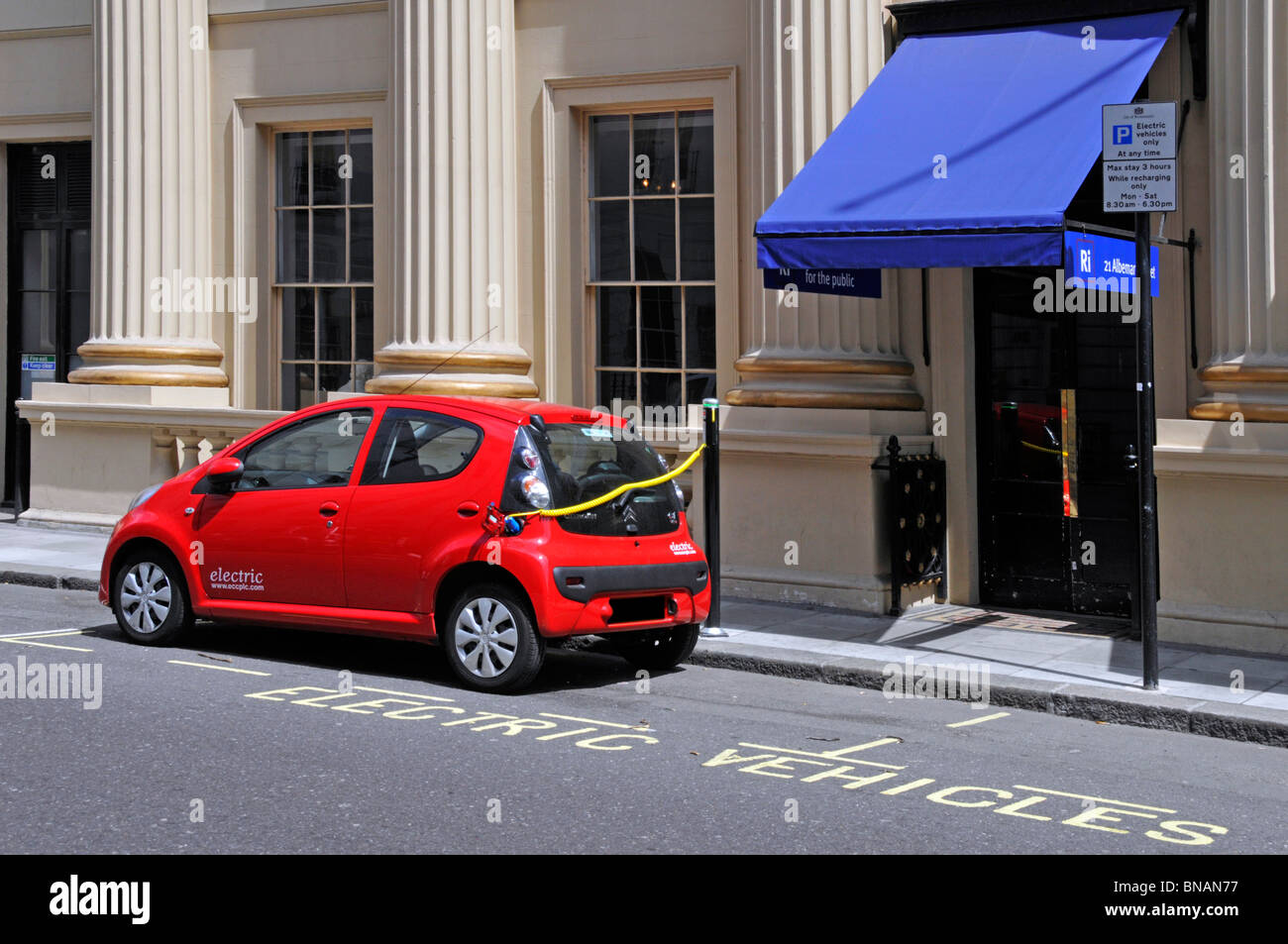 Environment & climate change issues in London have resulted in dedicated vehicle bays for electric car use & low parking fees Westminster England UK Stock Photo