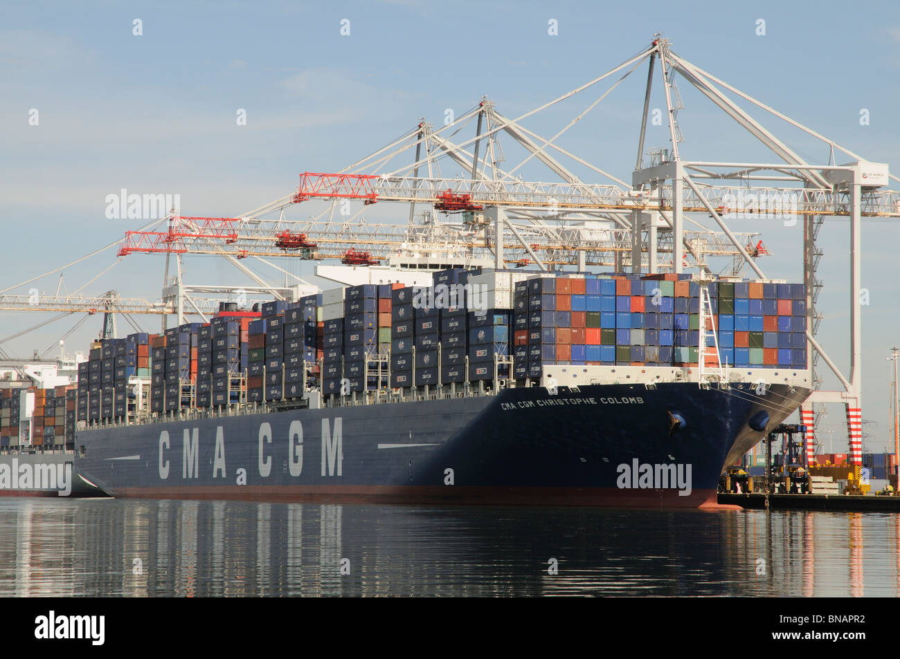 One of the worlds largest container ships the CMA CGM Christophe Colomb on the quayside at DP World Southampton England UK Stock Photo