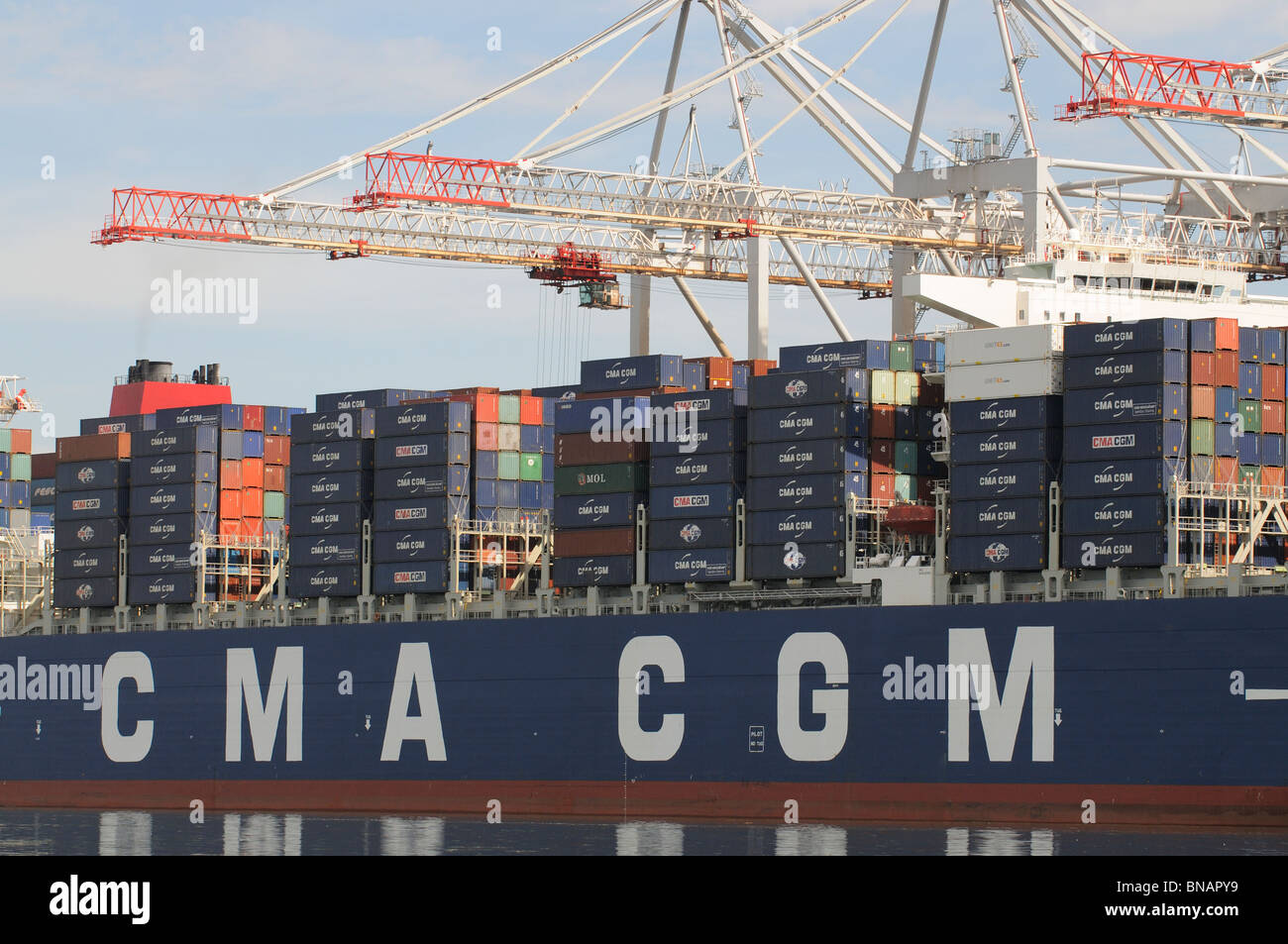 One of the worlds largest container ships the CMA CGM Christophe Colomb on the quayside at DP World Southampton England UK Stock Photo